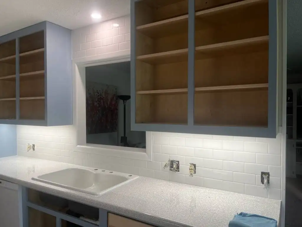 White Kitchen with Tile Backsplash