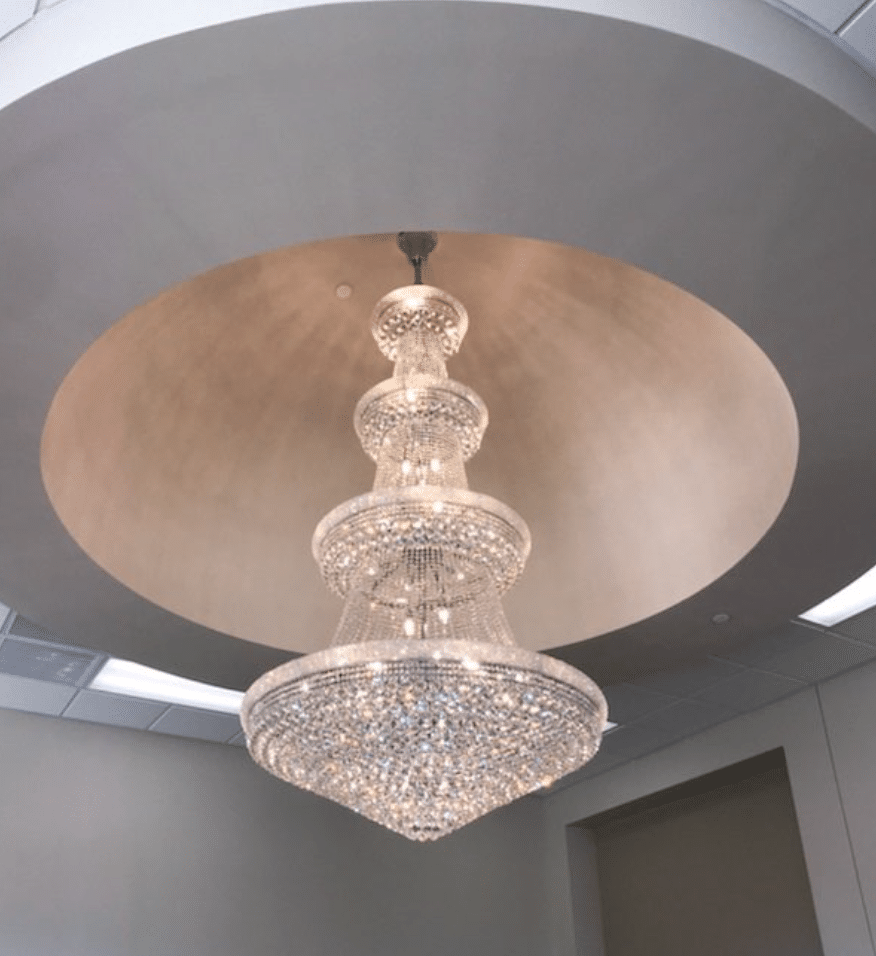 Stunning chandelier hanging from the ceiling