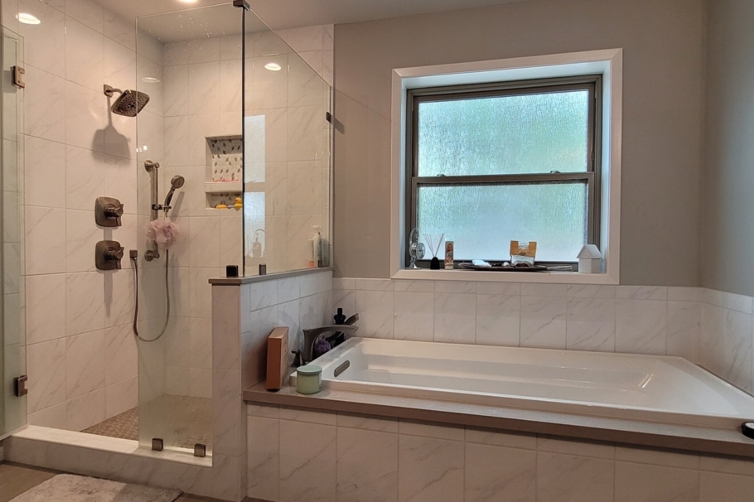 Bathroom Shower and Tub With White Tiles