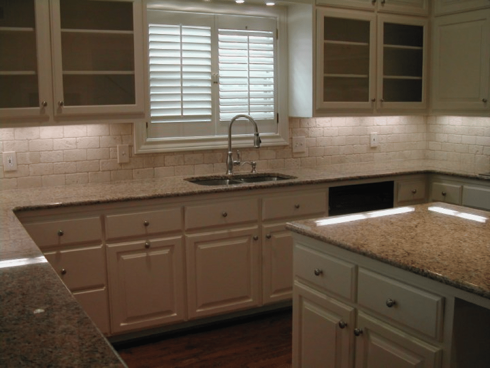 Traditional kitchen with beige cabinets.